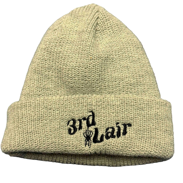 Grey knit beanie with '3rd Lair' embroidery on a gray background