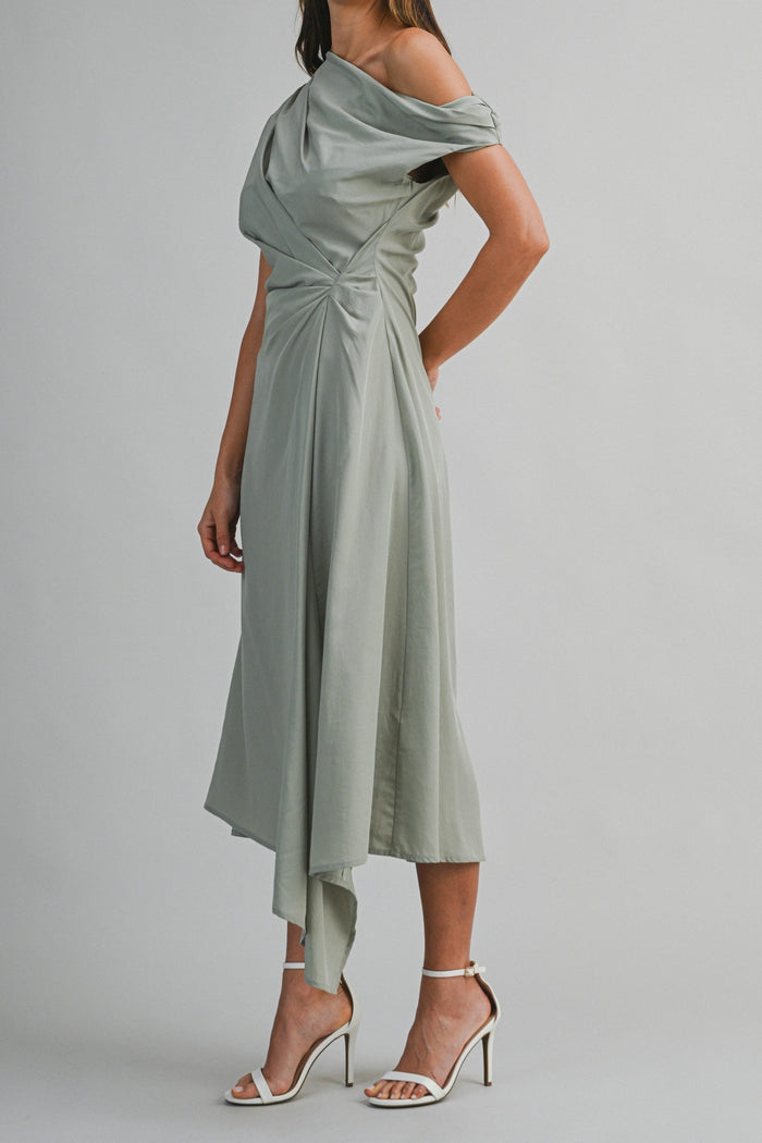 Sage green one-shoulder midi dress with draped neckline, cinched waist, and asymmetrical hemline.