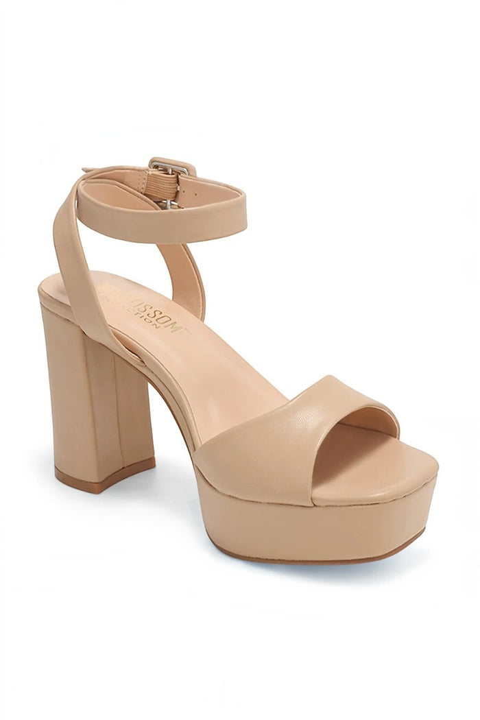 RSG Formals DeBlossom Anya nude block heel sandals with open-toe design and adjustable ankle strap for formal events.