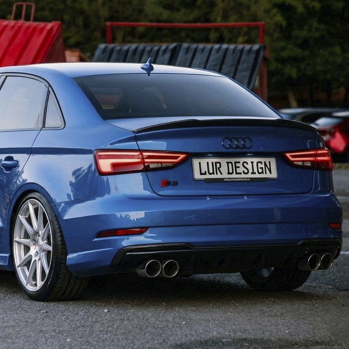 Rear Duckbill  Spoiler Cap lip Audi A3 8V Sedan 
Blue car with a black spoiler on a white background, featuring Lur Design logo.