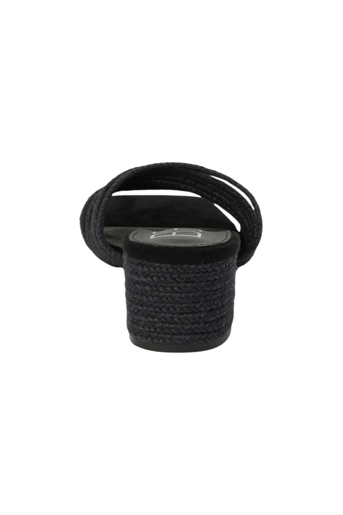 Black woven slide sandal with cylindrical heel and fabric strap, viewed from rear angle.