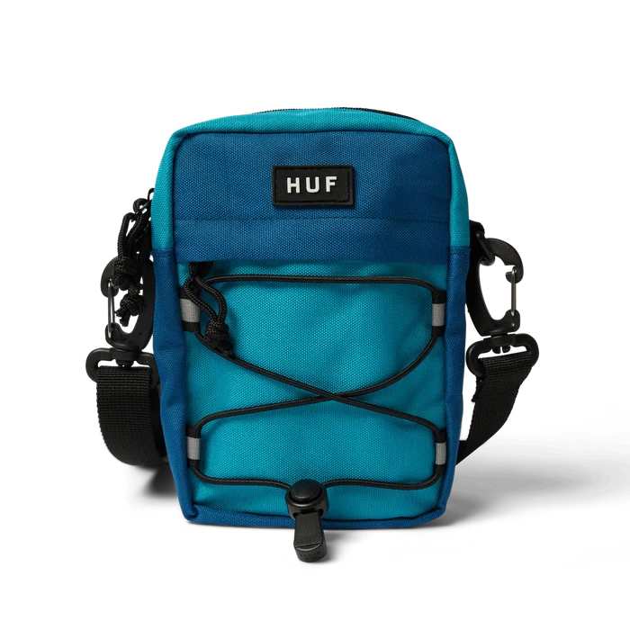 • Shell: 100% nylon x-pac fabric
• Lining: 210D nylon with PU coating
• Spacious main compartment with dualzippers
• Front zip-pocket
• Rubber injection molded patch at front
• Sock cord net
• Adjustable strap with clip attachment
• Approximately 6.75” H X 4.75” W X 2.0” D