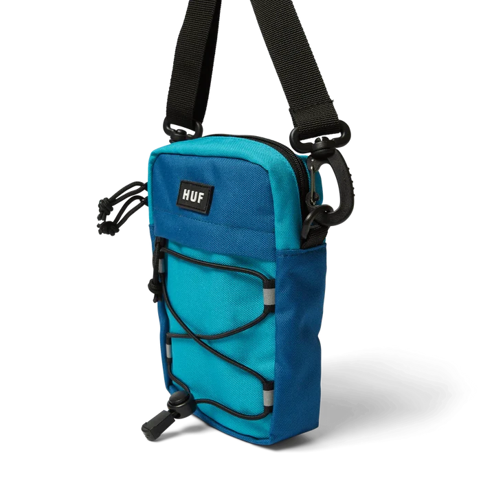 • Shell: 100% nylon x-pac fabric
• Lining: 210D nylon with PU coating
• Spacious main compartment with dualzippers
• Front zip-pocket
• Rubber injection molded patch at front
• Sock cord net
• Adjustable strap with clip attachment
• Approximately 6.75” H X 4.75” W X 2.0” D