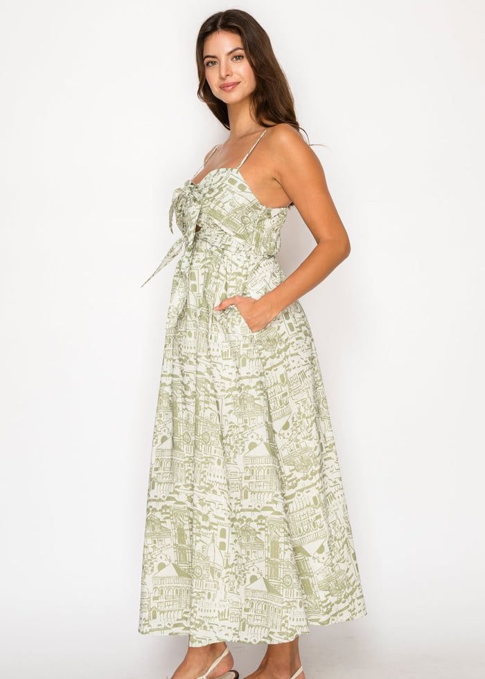 Sage and cream architectural print maxi dress with adjustable straps, sweetheart neckline, and side pockets.