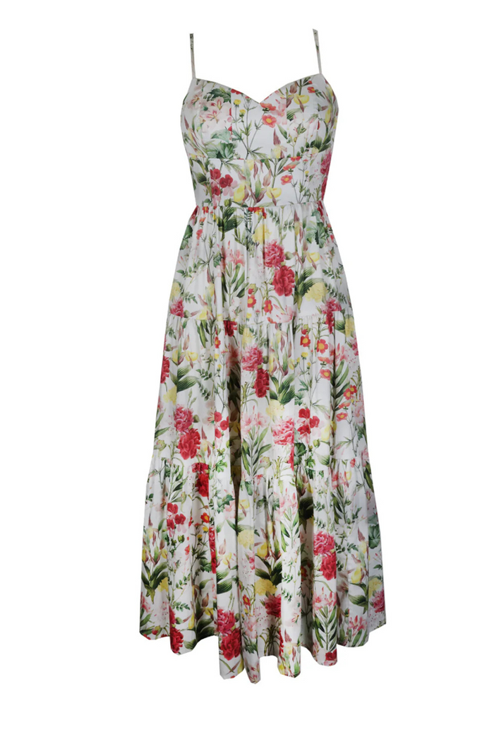 Sleeveless maxi dress with sweetheart neckline in cream with red, pink, and yellow floral print throughout.