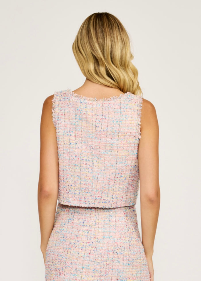 Sleeveless cropped vest top in multicolored tweed fabric with textured weave, shown from back view.