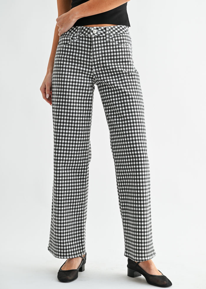 Black and white gingham patterned mid-rise jeans with straight leg silhouette.