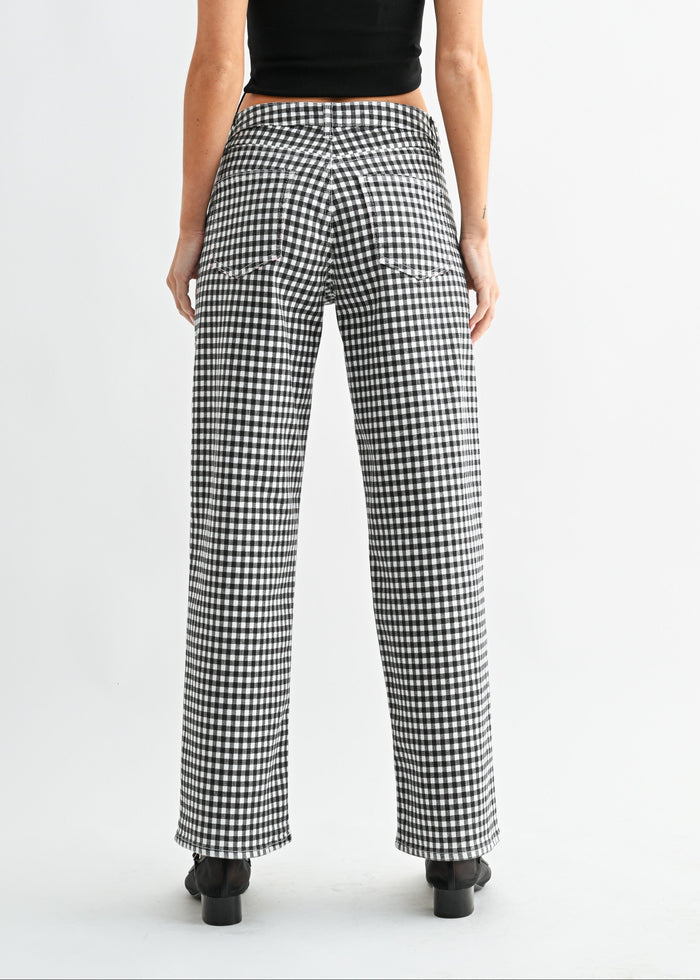 Black and white gingham jeans with mid-rise waist and straight leg silhouette, shown from back view.