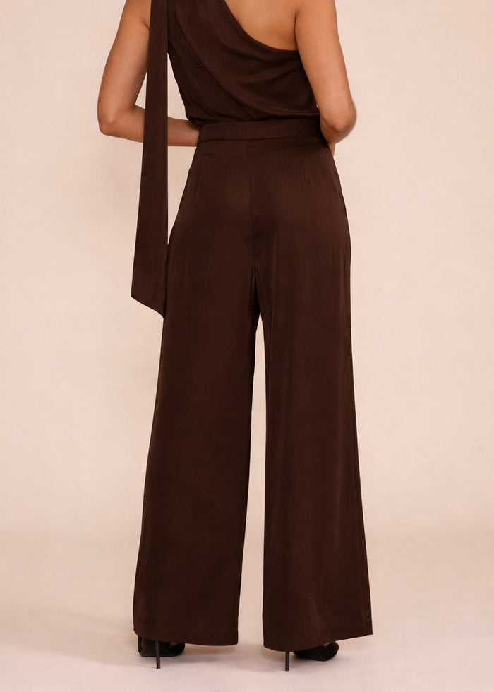 Brown satin wide-leg pants with high waist and center seam detail, shown from back view.