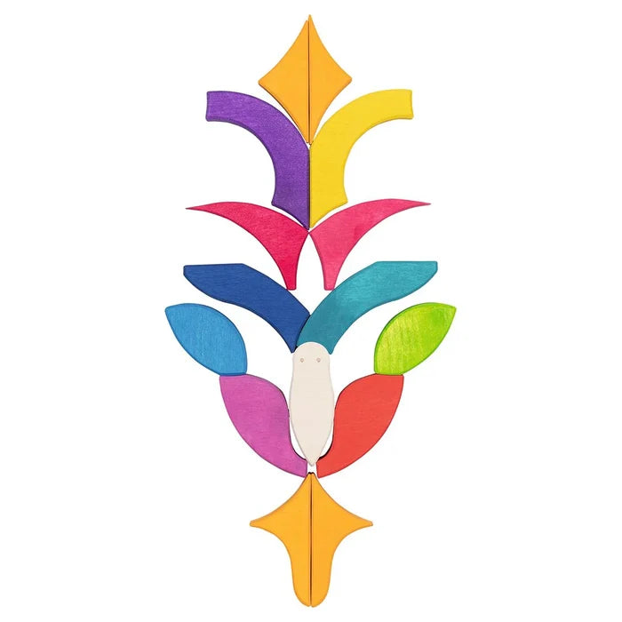 Goki Butterfly Mariposa Tile Puzzle pieces arranged in free play as a tall decorative totem or plant shape, with the white body piece at center and all 15 maple wood pieces stacked vertically in a symmetrical pattern using orange, yellow, purple, pink, red, blue, teal, and green pieces on a white background