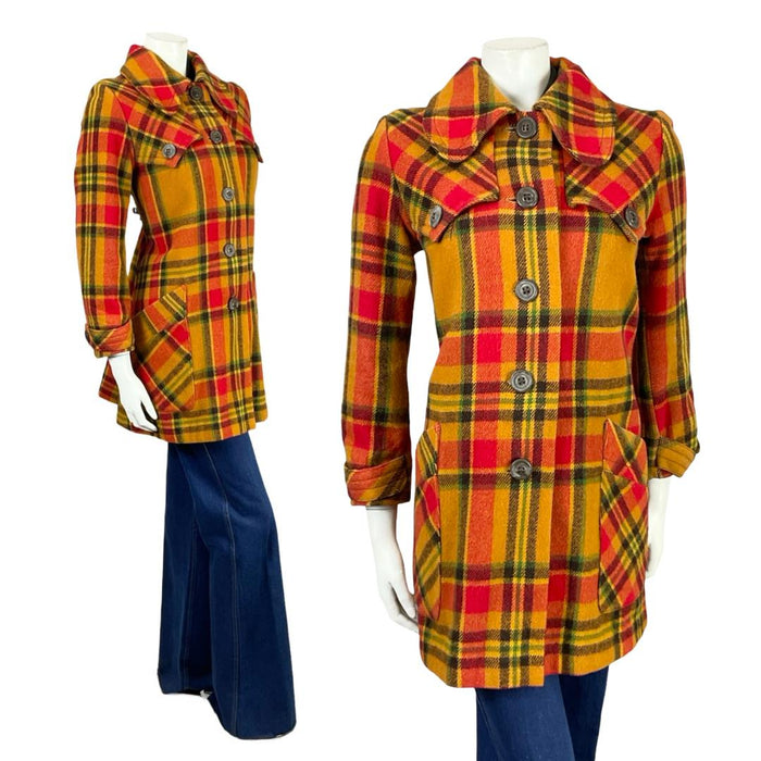 Shrinking Violets Vintage yellow and red plaid mod coat with a dog ear collar on a white mannequin wearing blue flared jeans