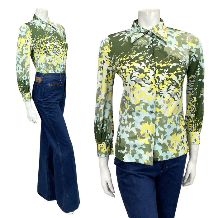 Mannequin wears a blue and green psychedelic leafy print 60s 70s dagger collar shirt shrinking violets vintage.