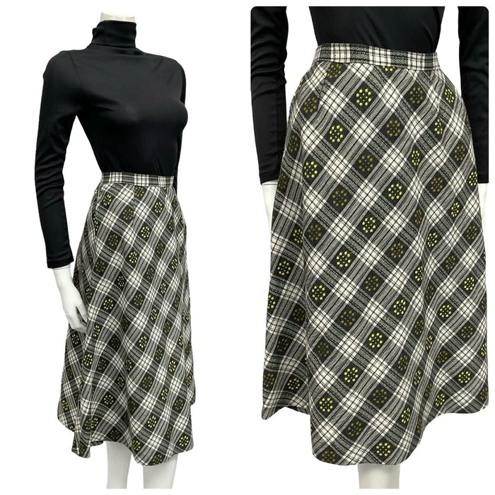 Mannequin wears a 60s 70s black white and yellow plaid floral print midi skirt with a black turtleneck