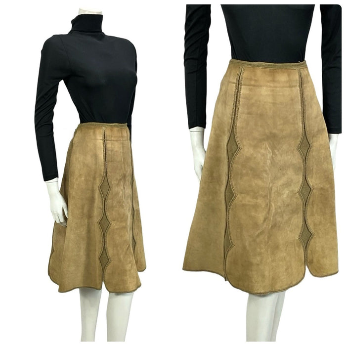 Shrinking Violets Vintage 60s 70s beige suede boho hippy crochet skirt on a white mannequin wearing a black turtleneck