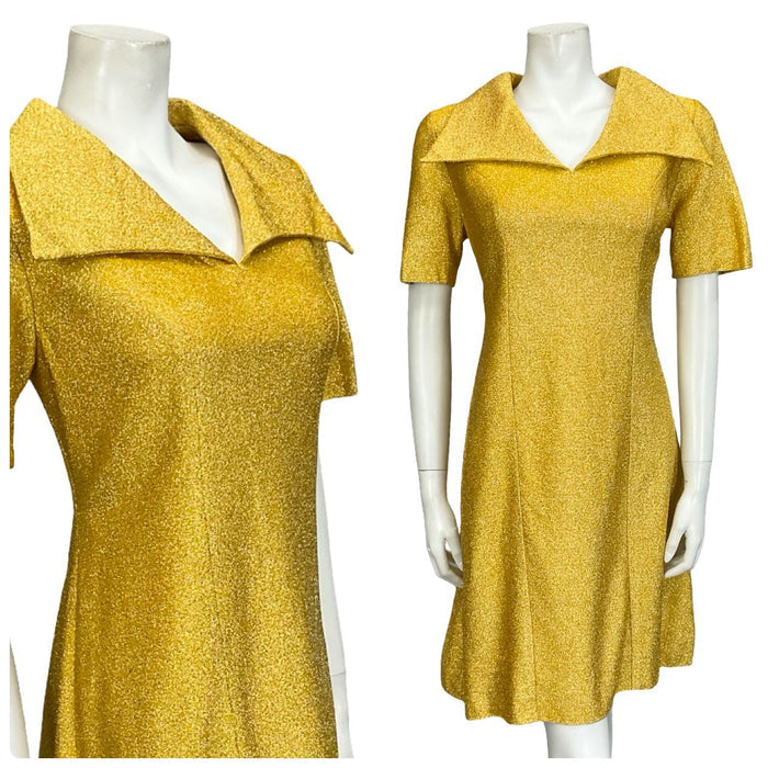 Mannequin wears a yellow gold glittery short sleeve dagger collar 60s mod shift mini dress.