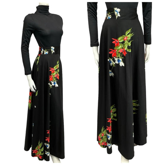 Shrinking Violets Vintage 60s 70s black maxi skirt with red and white floral print on a mannequin wearing a black turtleneck