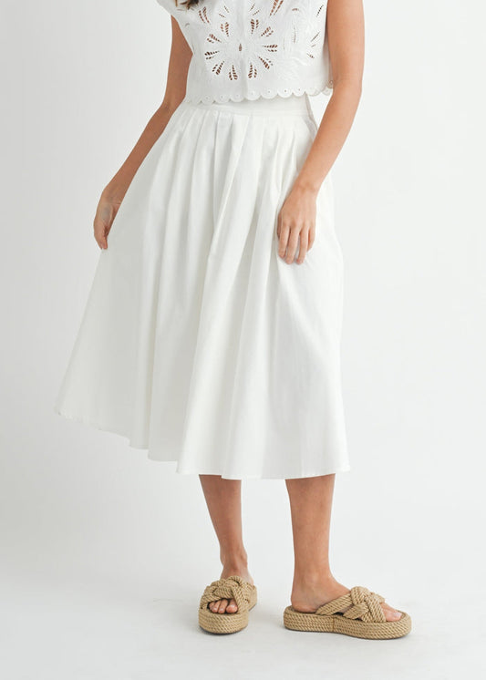MABLE WHITE MIDI SKIRT – A CLEAN, LINEN-BLEND MIDI WITH A FLATTERING PLEATED WAIST AND STREAMLINED SILHOUETTE